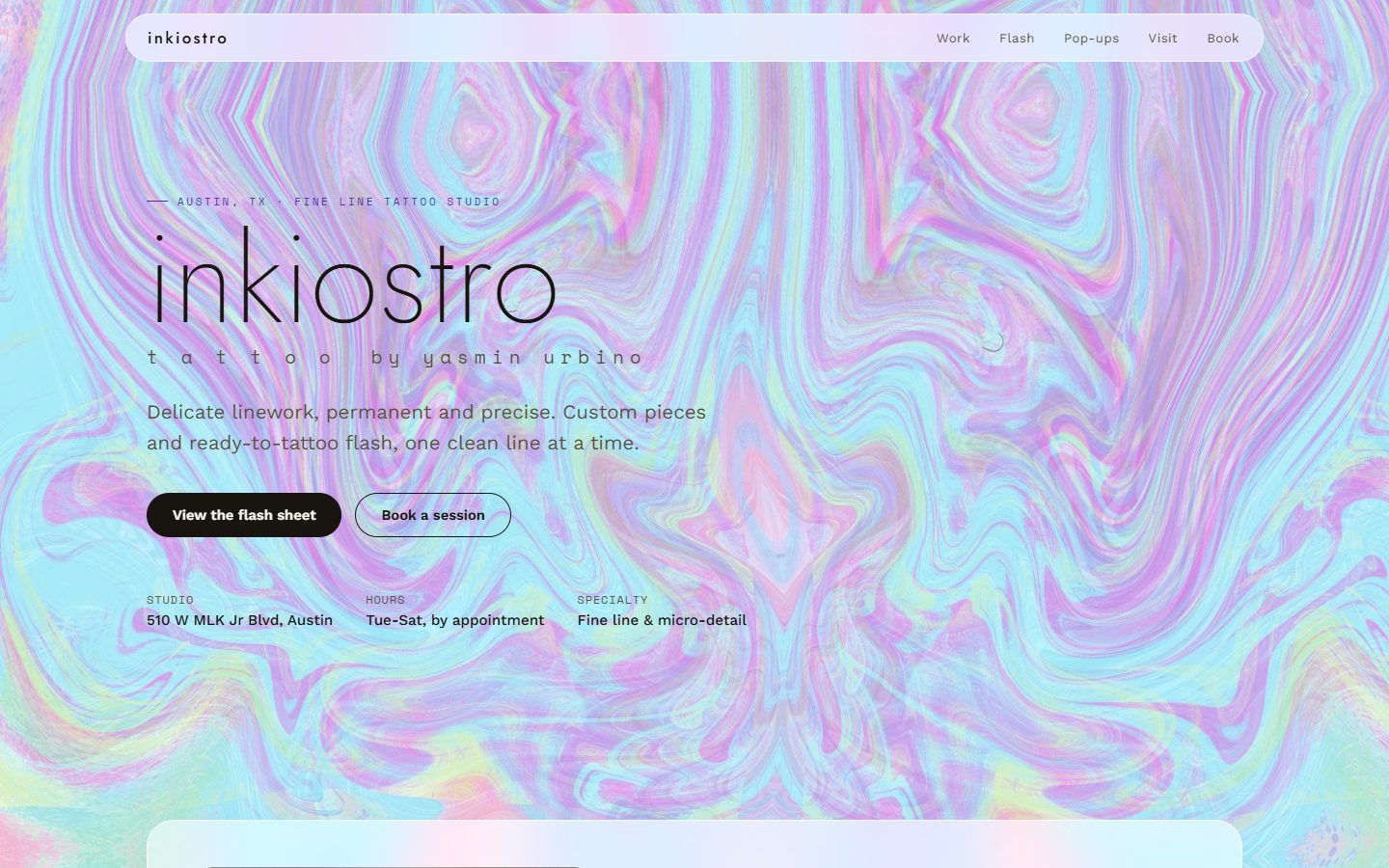 Screenshot of the live Inkiostro Tattoo website, showing its animated holographic hero section